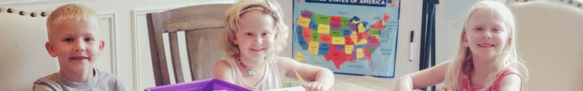 hero banner of three young students studying together.