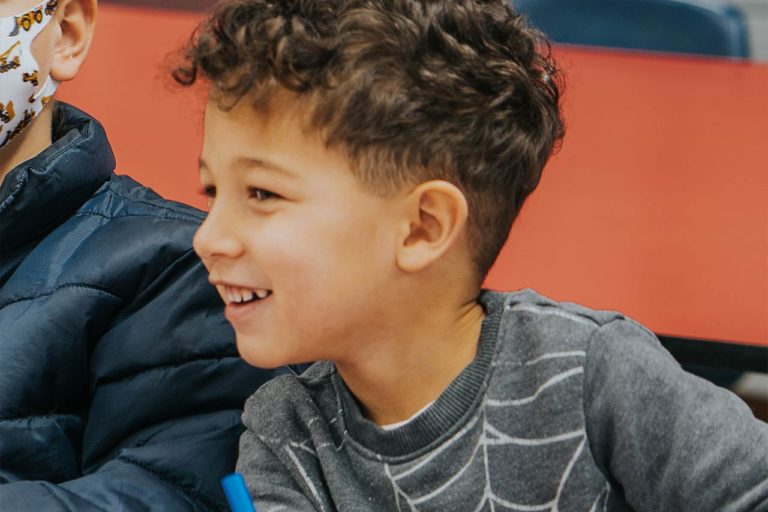 image of young preschool student smiling