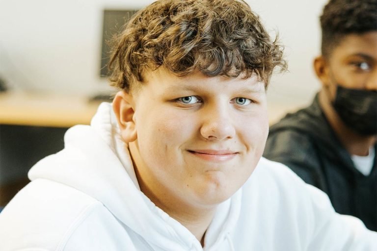 image of a young male student smiling
