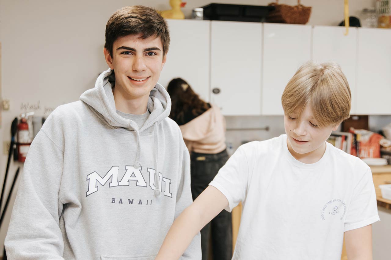 image of students preparing ingredients for a meal recipe